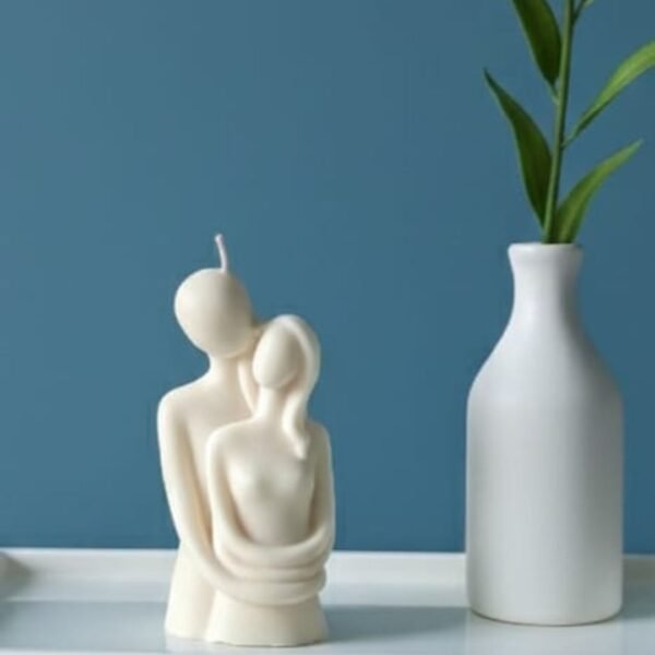 couple hugging white scented candle